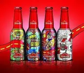 botellas-aluminio-cerveza-dorada-carnaval-486x424.webp