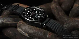 single-red-deepsea-rolex-sea-dweller-watch-1.webp