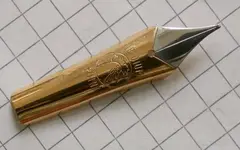 plumin bock gallo acero.webp