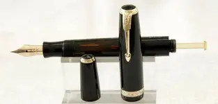 PARKER DEB NEGRA TRANSP 14.webp