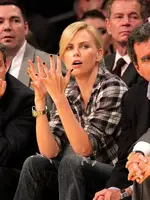 Charlize-Theron-Rolex-DEEP-SEA-Lakers-Game-Clapping.webp