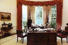 250px-President_Reagan_alone_in_the_Oval_Office_1984.webp