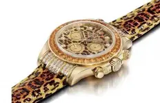 rolex-daytona-leopard-yellow-sapphire-diamond-gold.webp
