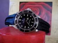 rolex+omega.webp