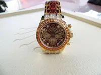 LEOPARD-gold-ROLEX-DATONA-ORANGE-STONE-PRICE-BASELWORLD-1.webp