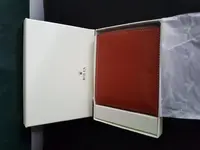 02 Caja y Billetera Rolex.webp