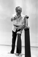 Ian-Fleming-Rolex-Explorer-Throwing-Knife-on-Beach.webp