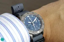 sinn-u1000-blue-wrist.webp