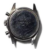 Paul-Newman's-Rolex-Daytona-Reference-6239-Drive-Carefully-Me-Engraving.webp