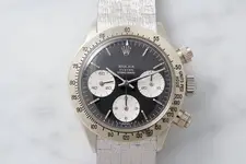 the-watch-is-fitted-with-a-sigma-dial-with-white-gold-indexes-which-are-consistent-with-the-c...webp the-watch-is-fitted-with-a-sigma-dial-with-white-gold-indexes-which-are-consistent-with-the-c...webp