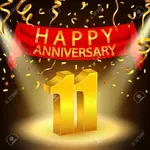 50758913-celebración-del-aniversario-11-del-feliz-con-confeti-dorado-y-punto-de-mira.webp