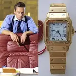 Michael Douglas as Gordon Gecko wearing an all gold Cartier Santos in the 1987 film Wall Stre...webp