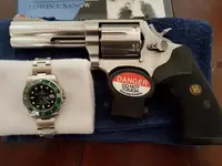 Rolex Submariner 40 mm Ref. 116610LV 'Hulk' & S&W .357 Mgn 4'.webp