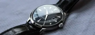 516057-fs-nib-lnib-orient-bambino-black-dial.webp