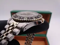 rolex gmt master 1675:3 steel gold 3148.webp