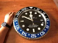 -rolex-wall-clock.webp