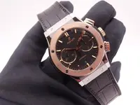 hublot classic fusion titanium gold chronograph 6585.webp