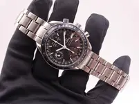 omega speedmaster triple day date reduced automatic 7176.webp