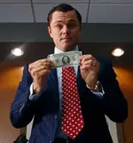 Leonardo-Dicaprio-Wolf-of-Wall-Street-Rolex-GMT-in-Yellow-Gold.webp