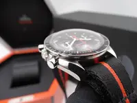 omega speedmaster professional speedy tuesday ultraman 9402.webp