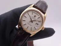 rolex day date 1803 gold 5045.webp