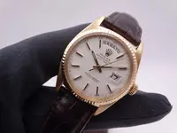 rolex day date 1803 gold 5058.webp