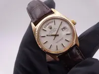 rolex day date 1803 gold 5059.webp