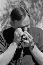 Neil_examines_a_rock_sample_during_the_Sierra_Blanca_trip.webp Neil_examines_a_rock_sample_during_the_Sierra_Blanca_trip.webp
