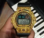 pharrell-gold-bape-casio-gshock-dw-6900.webp
